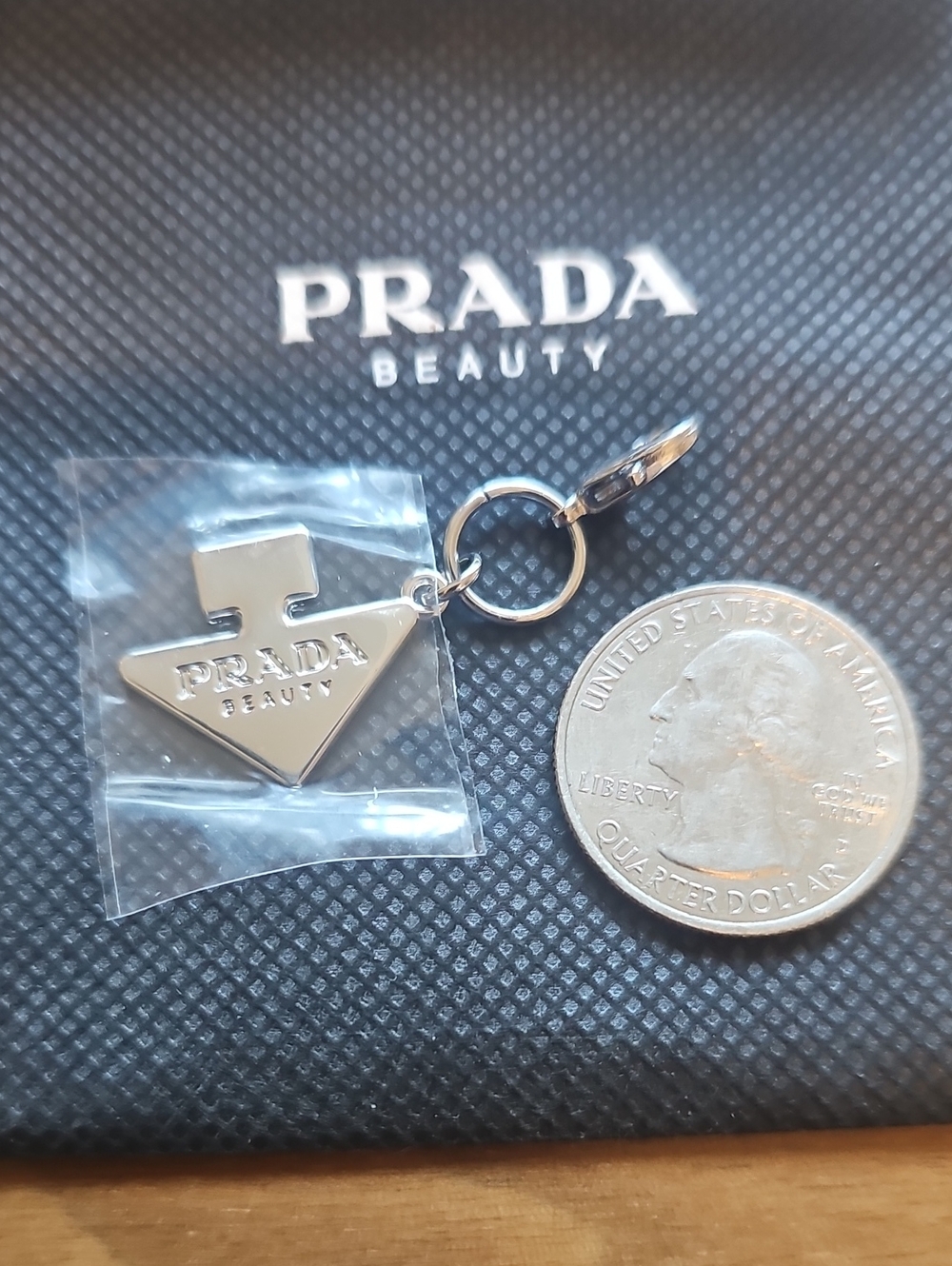 Prada Silver Triangle Key Charm .